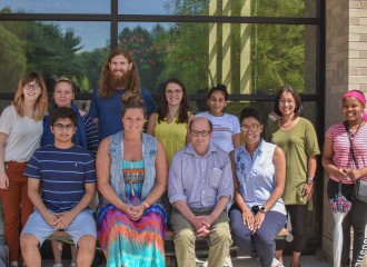 A group photo of workers and volunteers at the Kalamazoo Refugee Resource Collaborative.