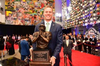 Jon Wassink poses with the Wuerffel Trophy.