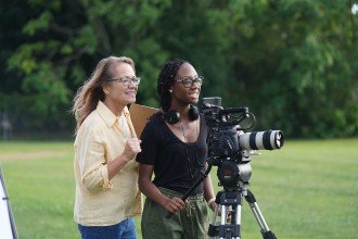 Tirrea Billings with Dr. Jen Machiorlatti on site shooting a film outdoors