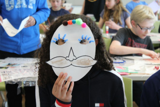Student with a mask on in a classroom
