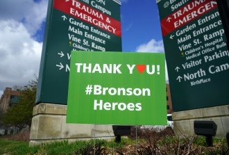 A sign outside Bronson Methodist Hospital reads "Thank you! #Bronson Heroes."