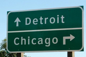 Photo of road sign in Kalamazoo pointing to Chicago and Detroit.