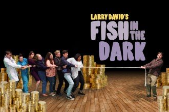 Actors have a tug-of-war to determine who will get a pile of gold coins. Text overlay reads: Larry David's Fish in the Dark.