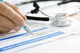 Stock photo of health insurance forms