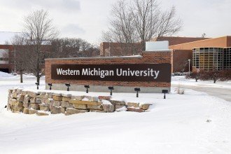WMU main entrance sign after a snowfall.