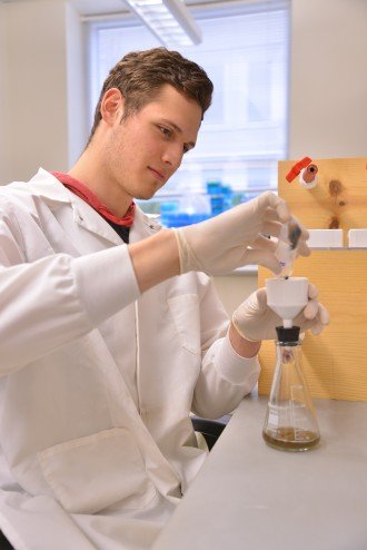 Biology graduate student in lab