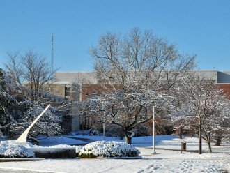 Photo of a snow-covered Wood Hall.