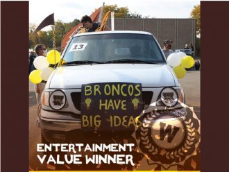 Image of a decorated truck with western color balloons and a sign that says "Broncos have big ideas"