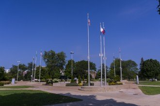 Western Michigan University celebrates the diversity of the campus population by rotating national flags at the set of flagpoles located in the center of main campus. 