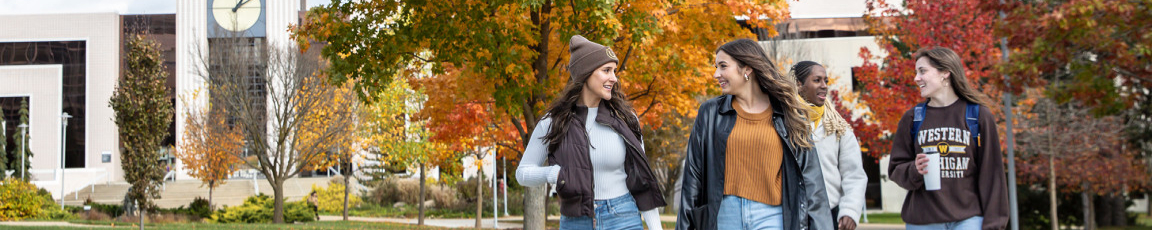 Students walking on campus, on a lovely fall afternoon.