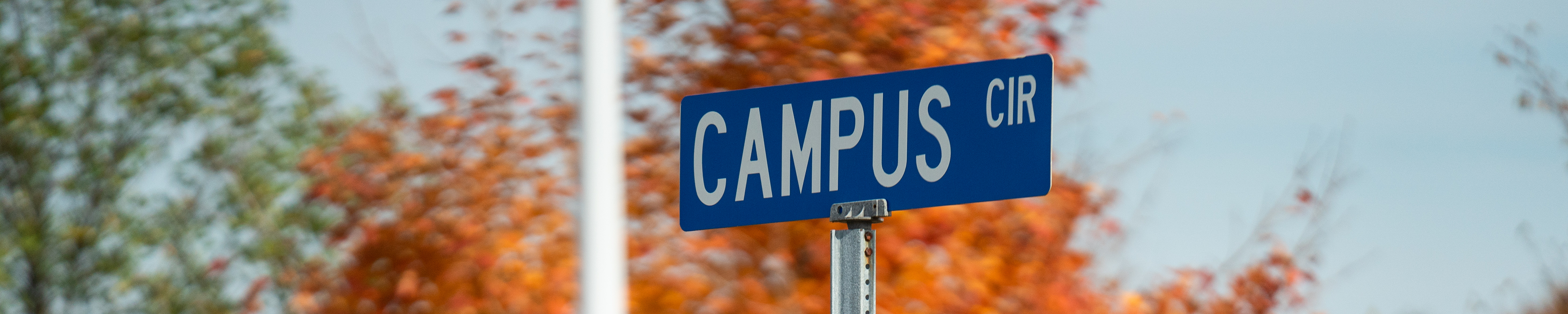 Page banner: Street sign reading "Campus Circle" on WMU campus