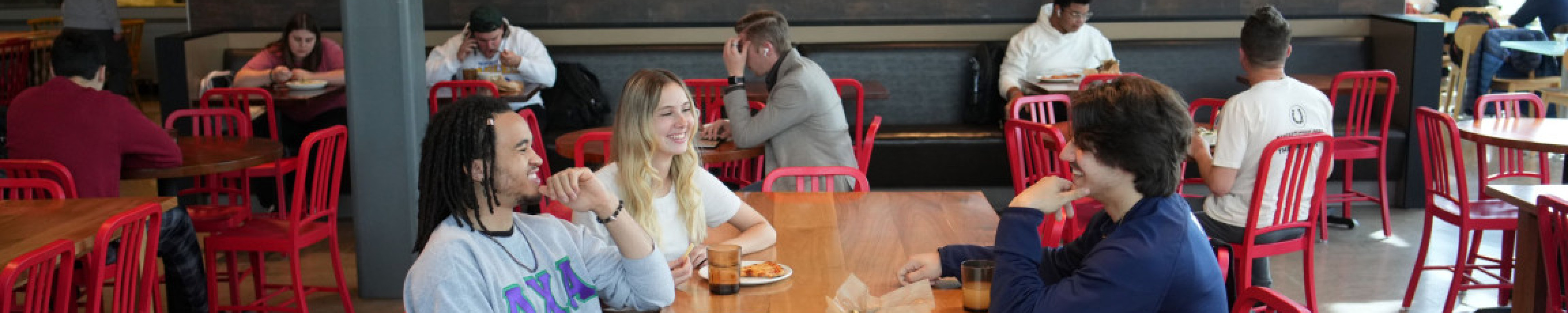 students eating in the Blazin' Bronco seating are 