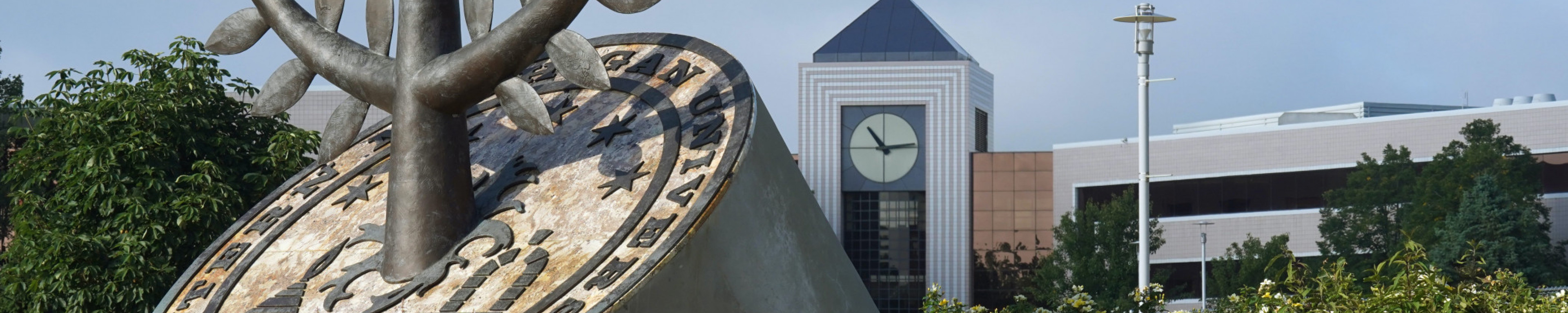 WMU seal in the foreground and Stewart tower in the background.