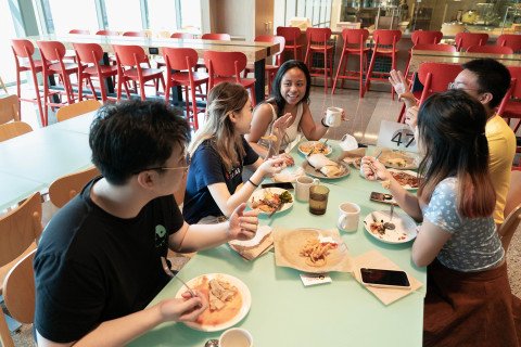 Students eating at a table
