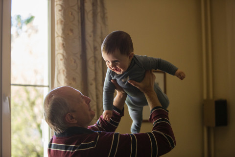 Grandparent playing with child