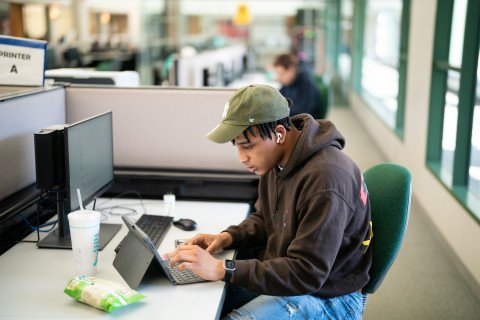 A student on a computer.