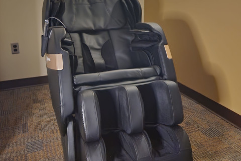 Massage chair in a room.