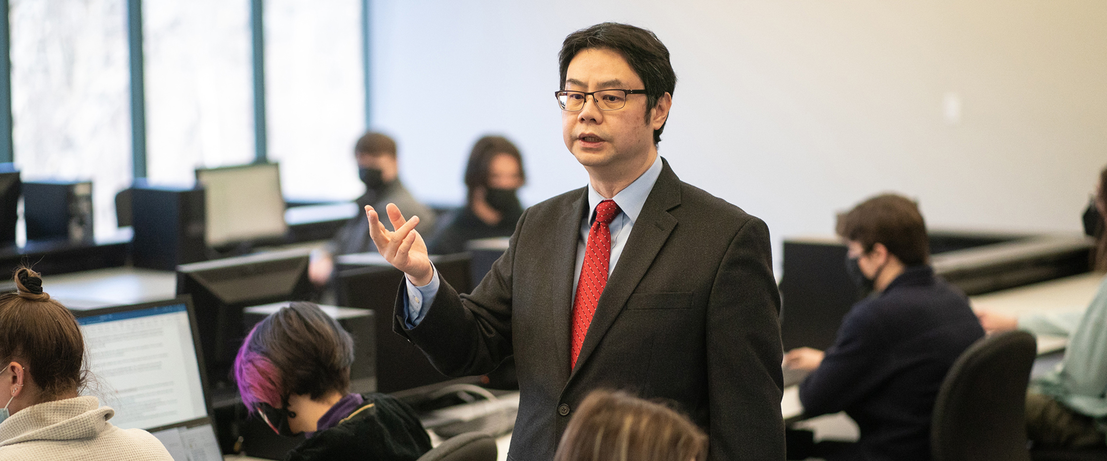 Dr. KC Chen instructs a business analytics class.