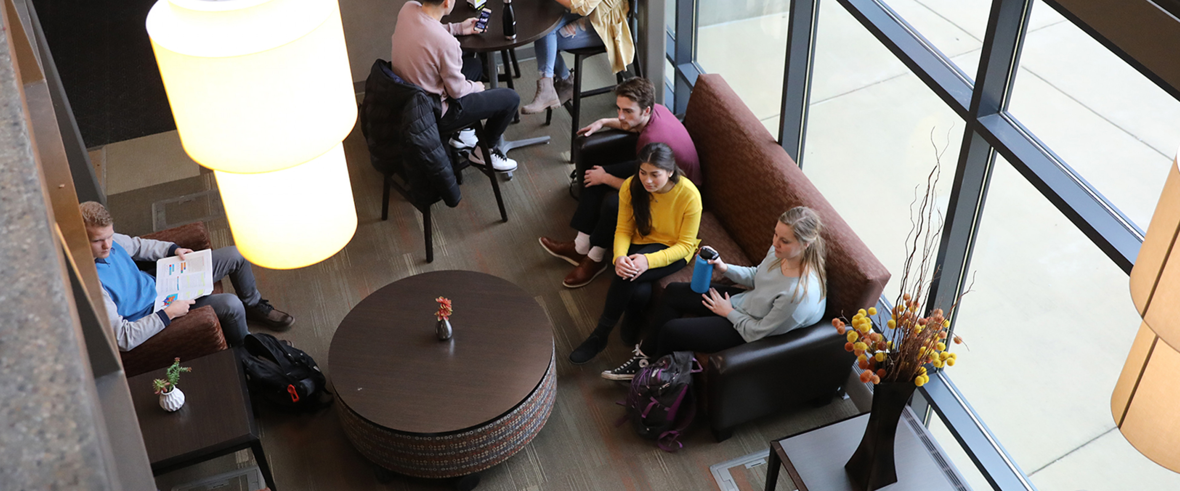 Students hanging out in the lobby of Western View.
