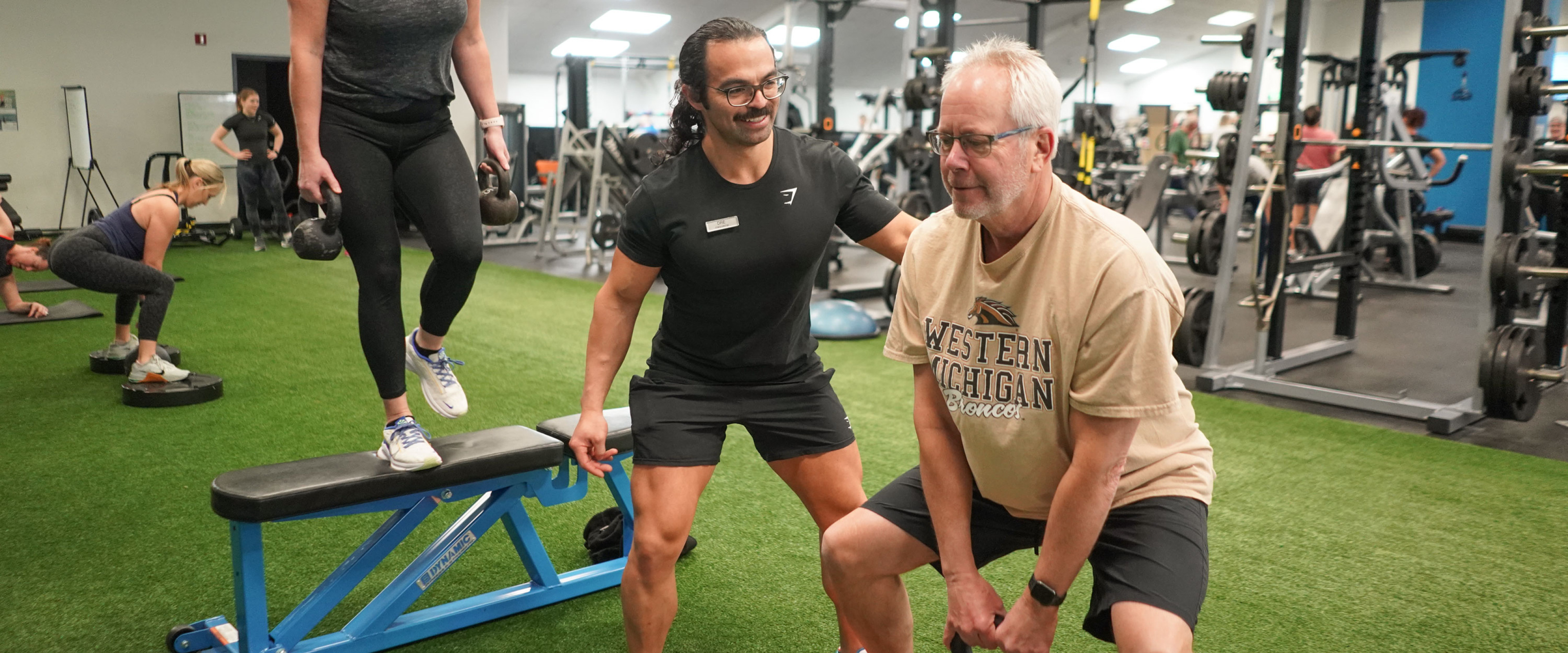 Western Michigan Employee with a personal trainer