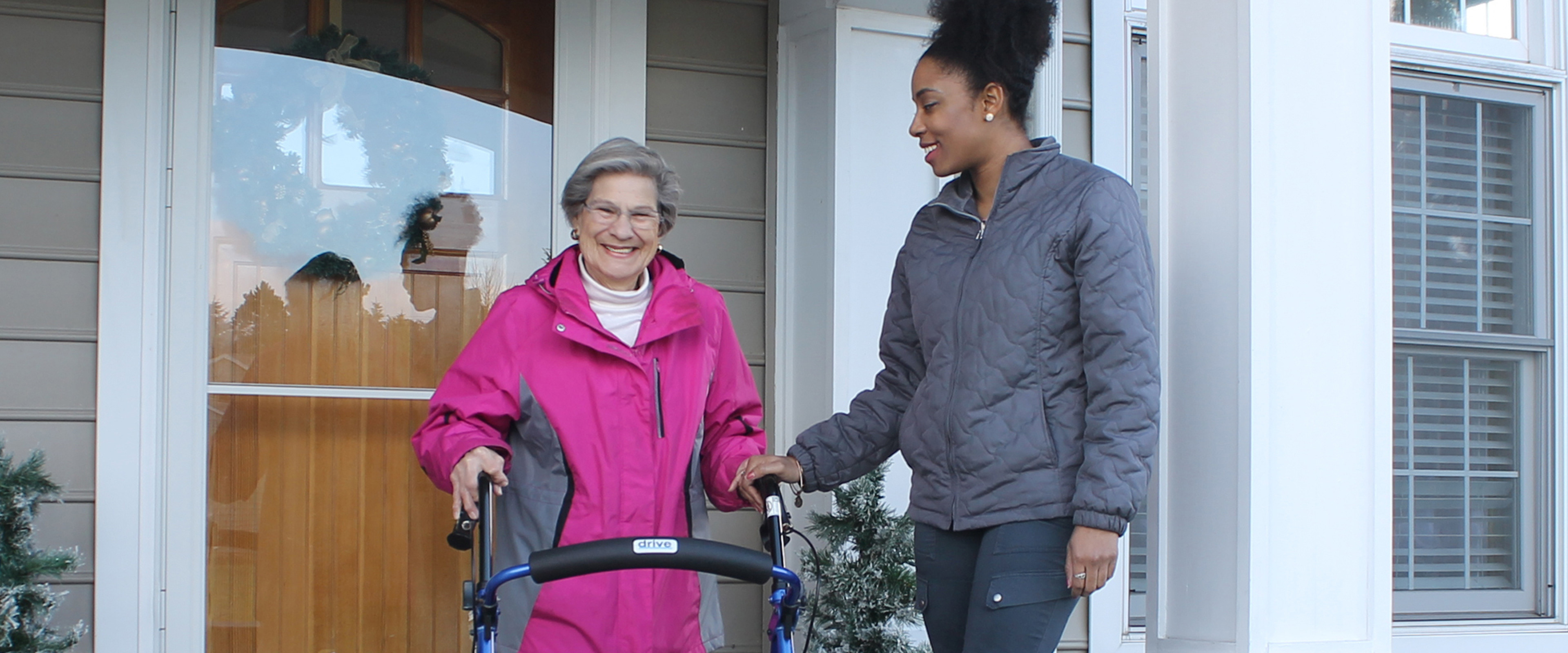 In home care worker helps a senior woman