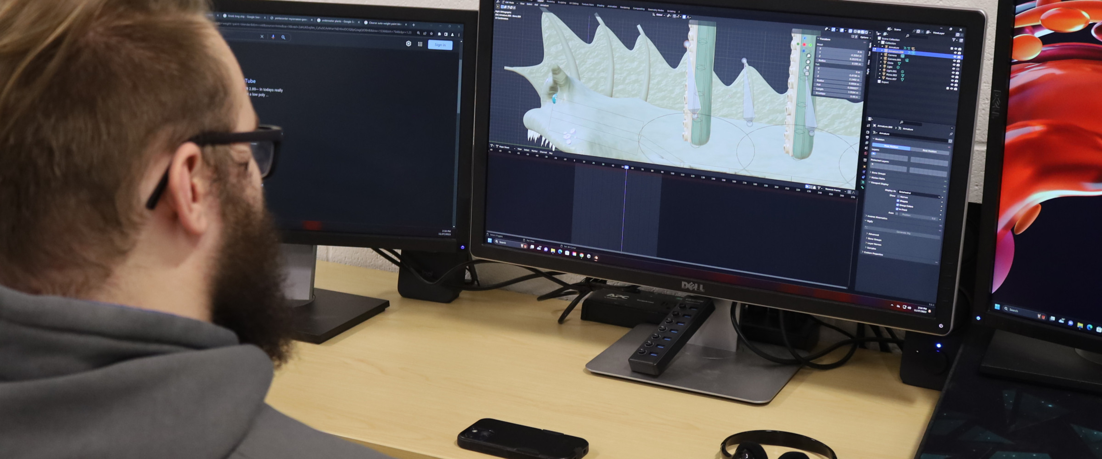 VITAL Student Technology Assistant creating 3D animations with Blender on PC.