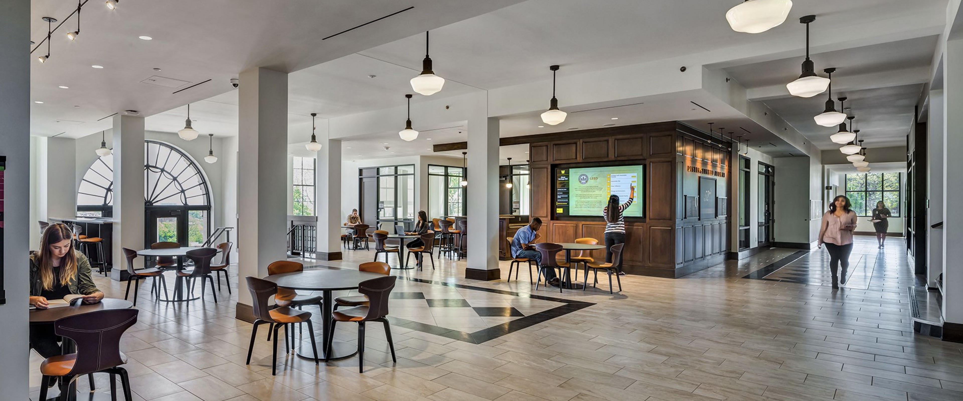 Interior of Heritage Hall lobby showing large open space and hardwood floors