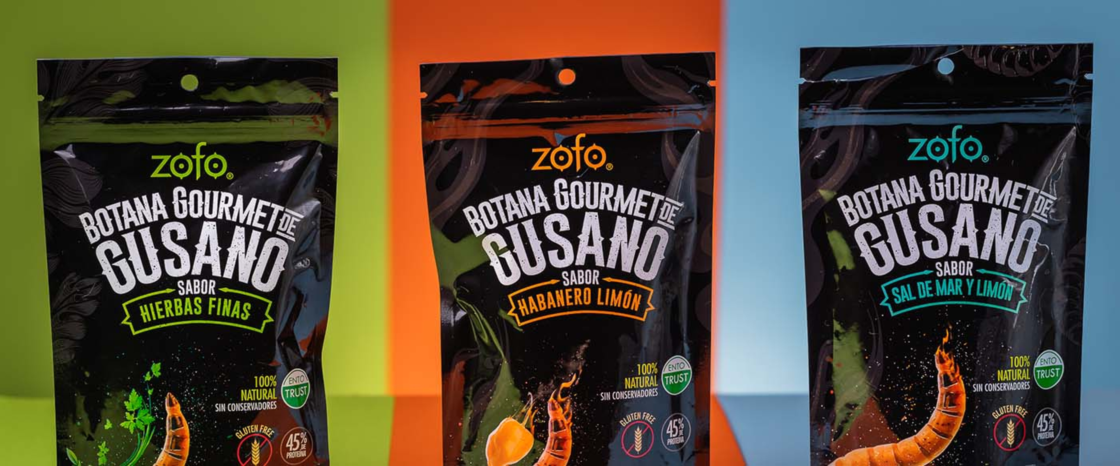 ZOFO, alternate protein snacks are displayed in three different flavors behind green, orange and blue backgrounds. 