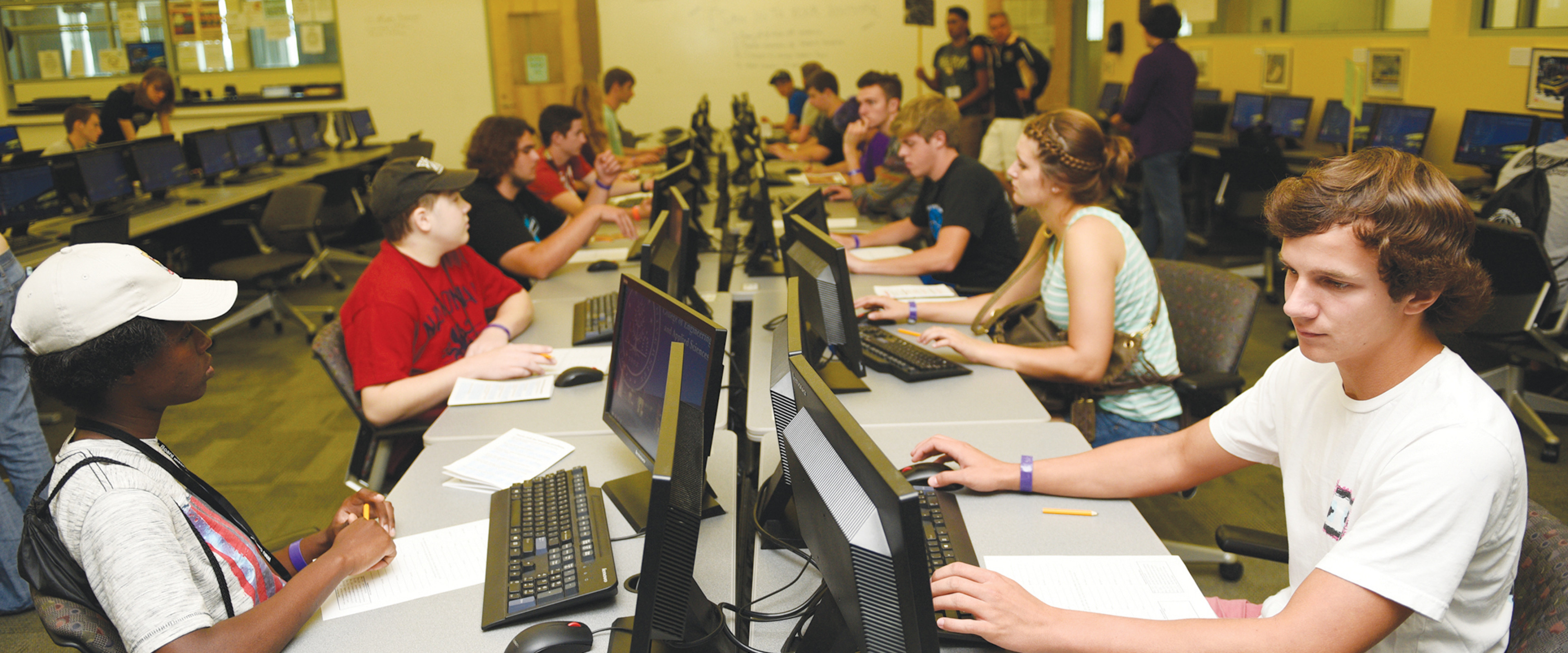 Students sitting in the Computer Aided Engineering Center in WMU's College of Engineering and Applied Sciences