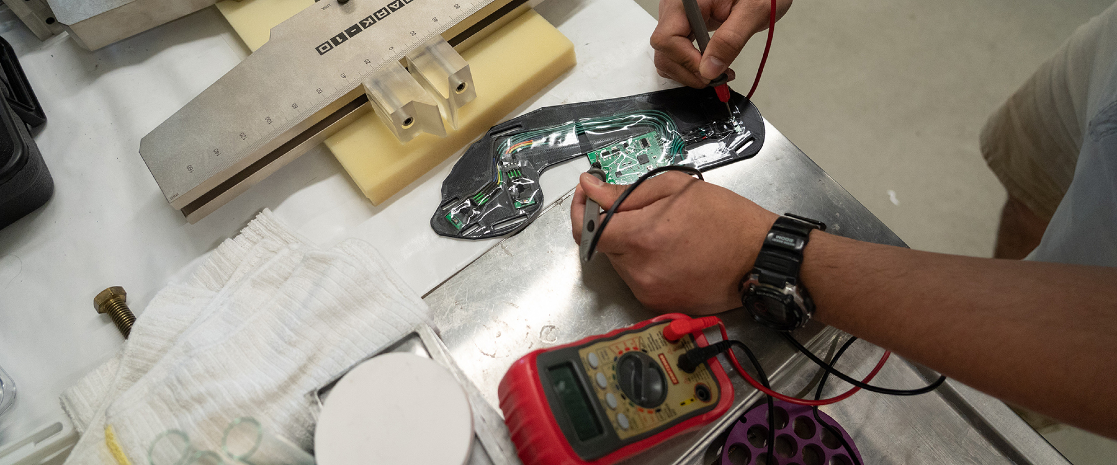 student in the electrical and computer engineering department working on a project