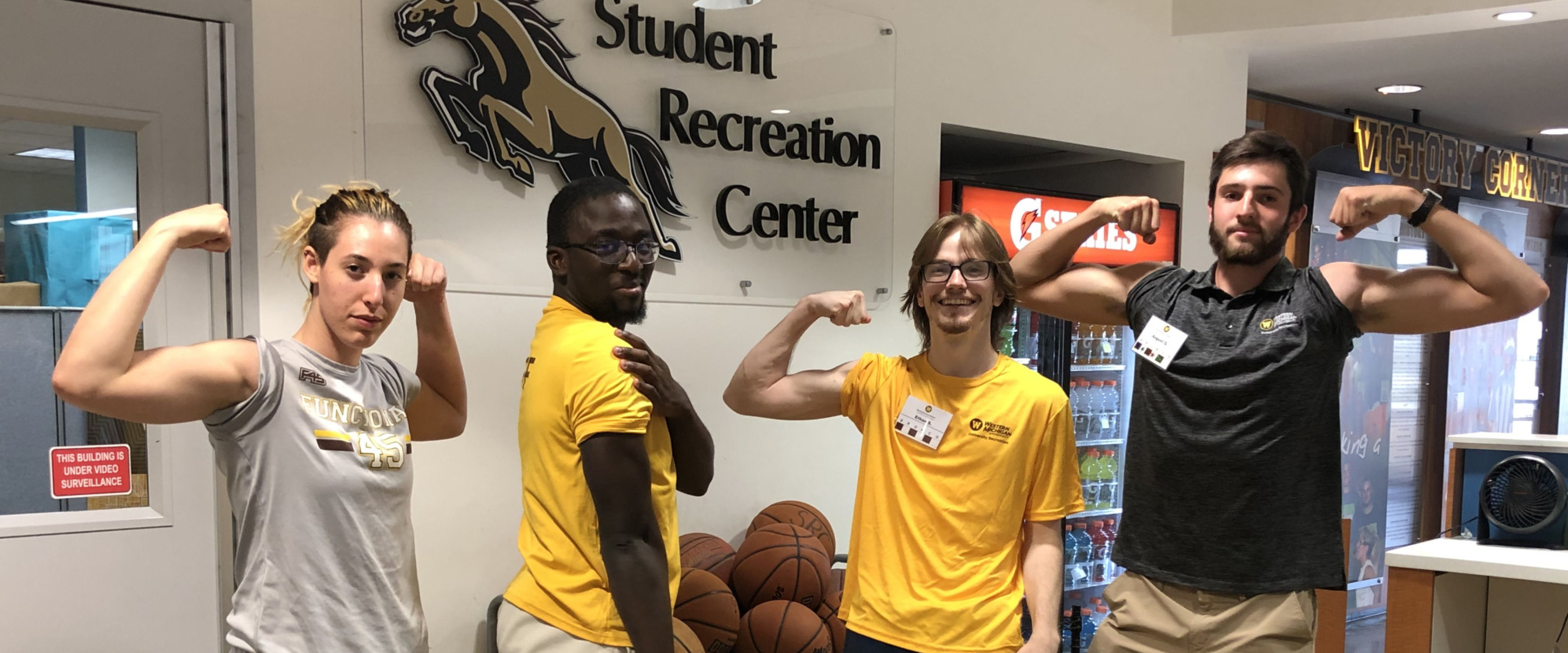 SRC Student employees of diversity flexing their muscles behind the SRC service desk