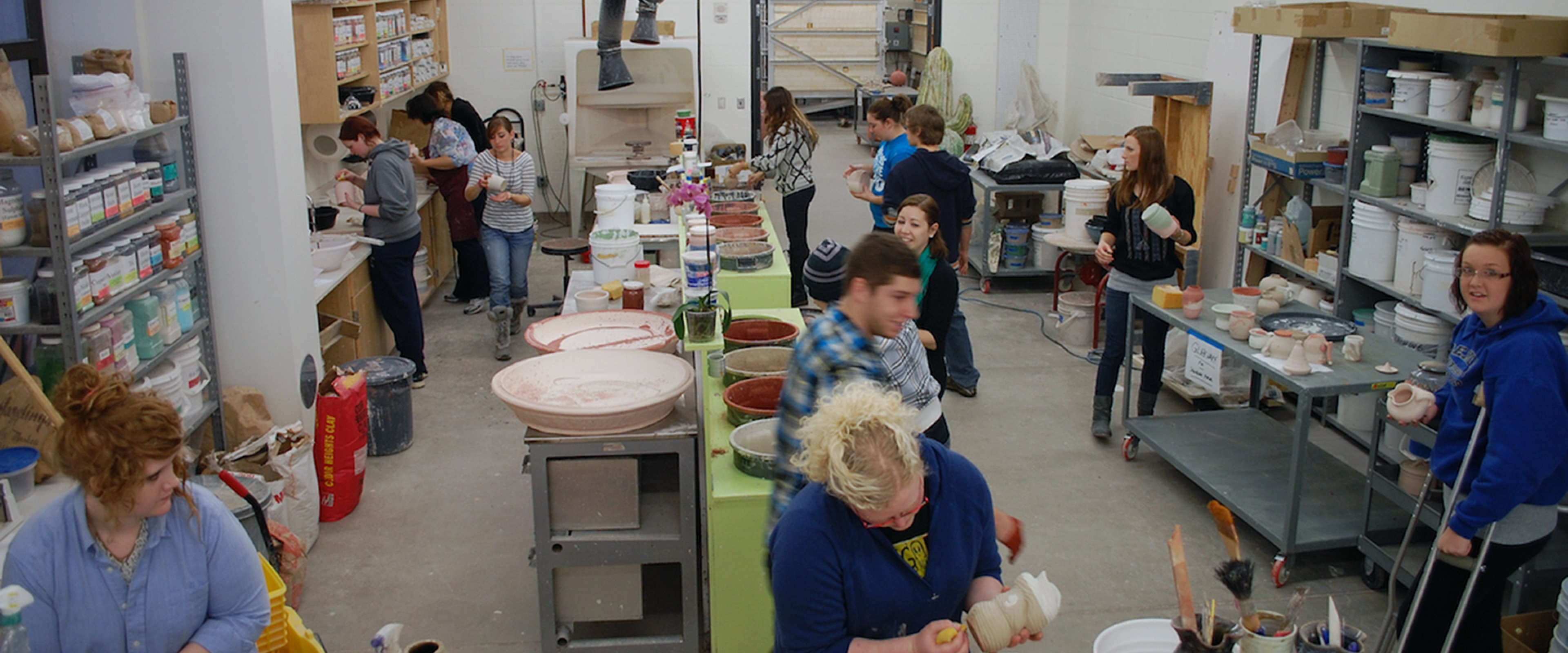 students working in a ceramics studio