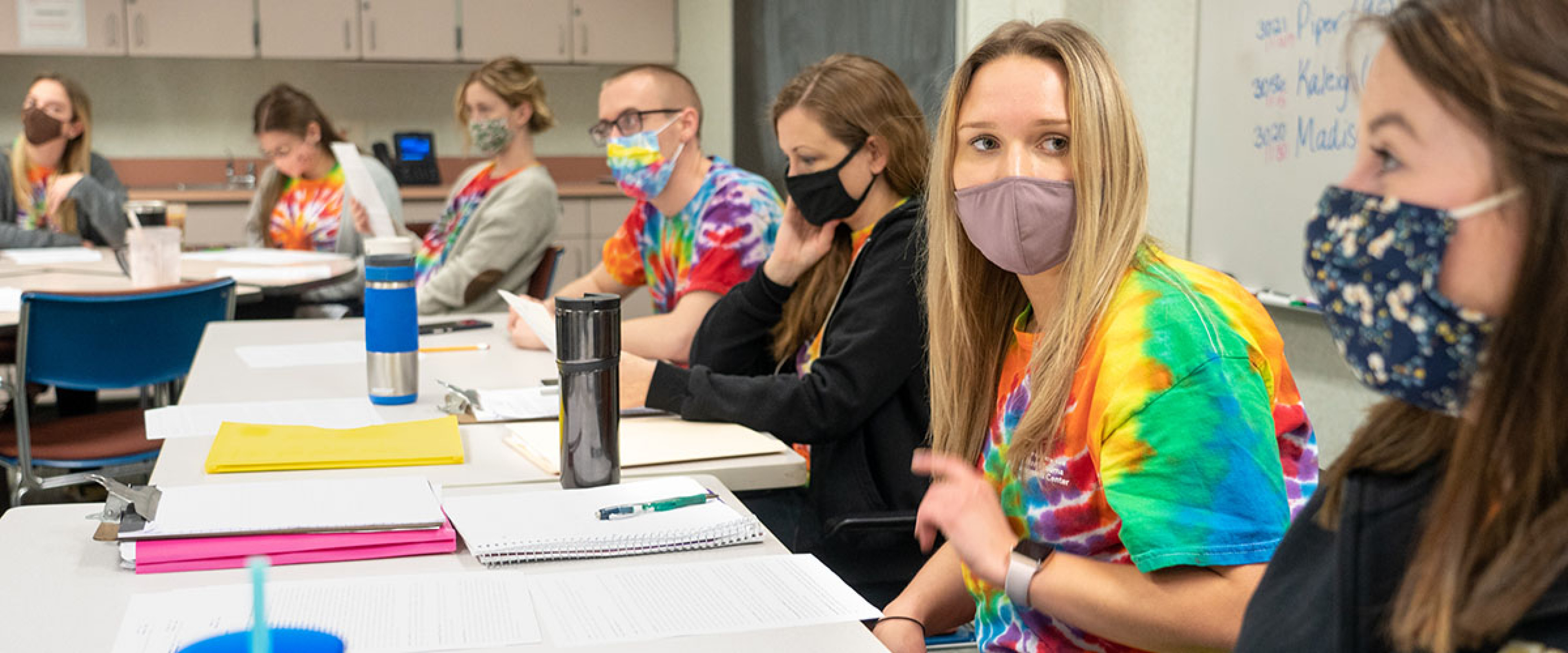 masked OT students around a table