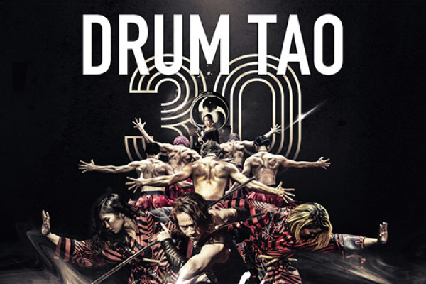 Drum Tao logo over a 30 year image and a huddle of dancers underneath
