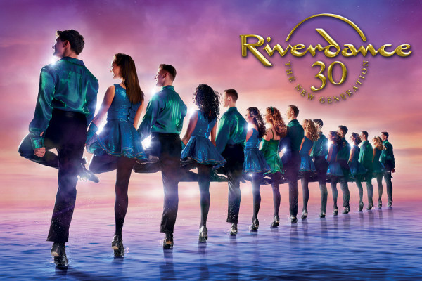 Line of dancers and Riverdance 30 logo