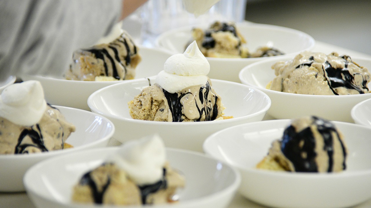 Students preparing ice cream dessert