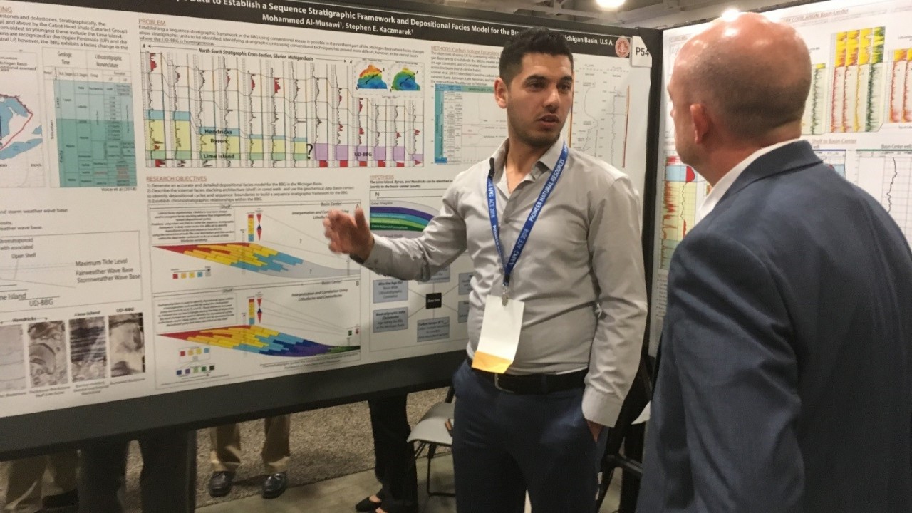 M.S. student, Mohammed Al Musawi, discussing his AAPG poster at the annual meeting in Salt Lake City, Utah