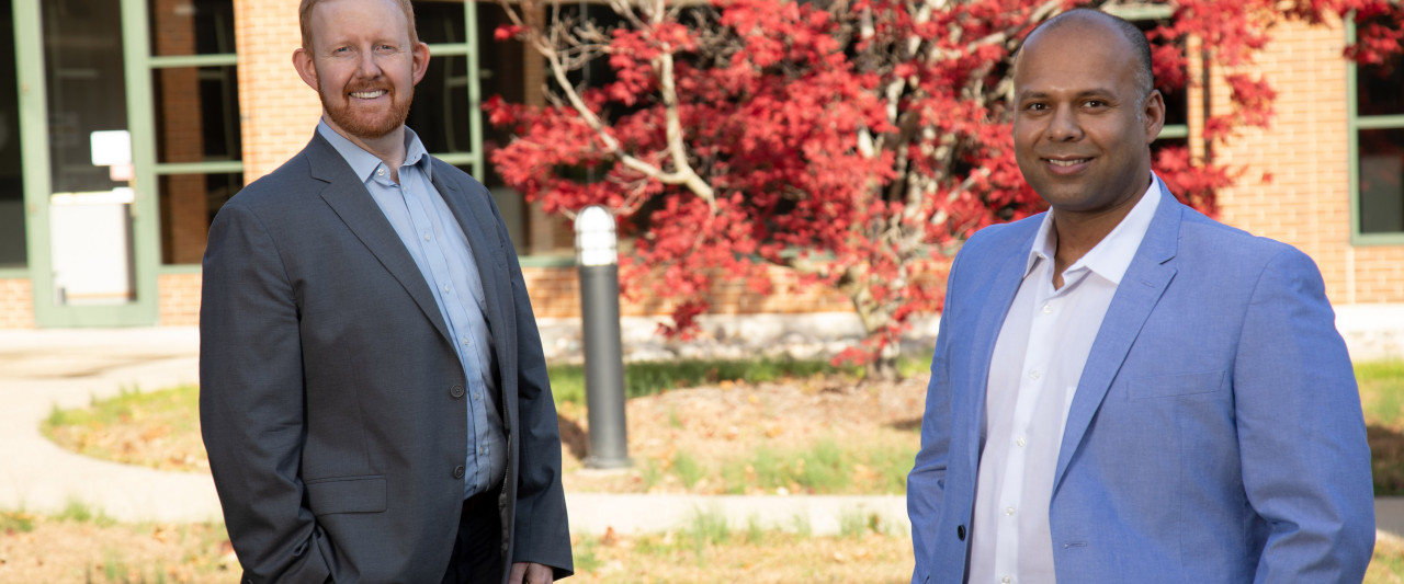 Pictured are Drs. Scott Cowley and Bidyut Hazarika standing outside and socially distanced