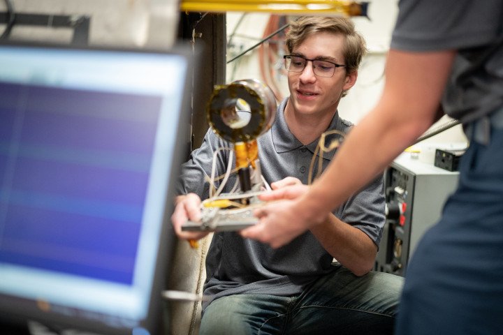 A student conducts research in the aerospace laboratory at Floyd Hall.