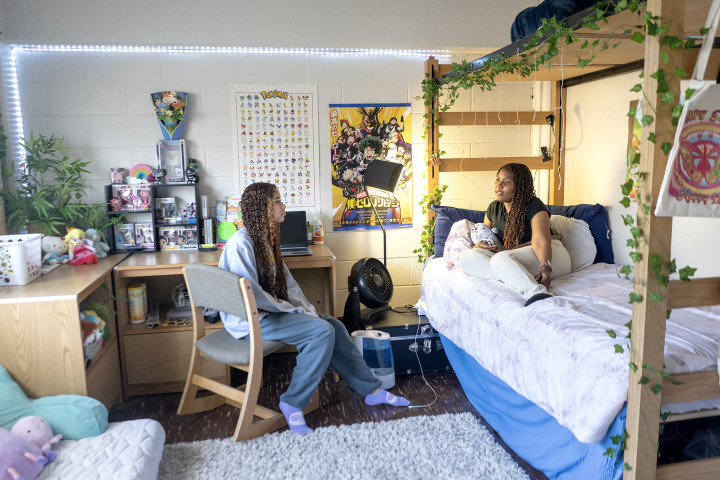 Students in their room relaxing, in the Valley's.