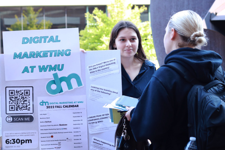 Students from the digital marketing association interacting at Business Bash