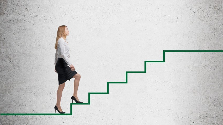 Graphic of woman climbing green steps