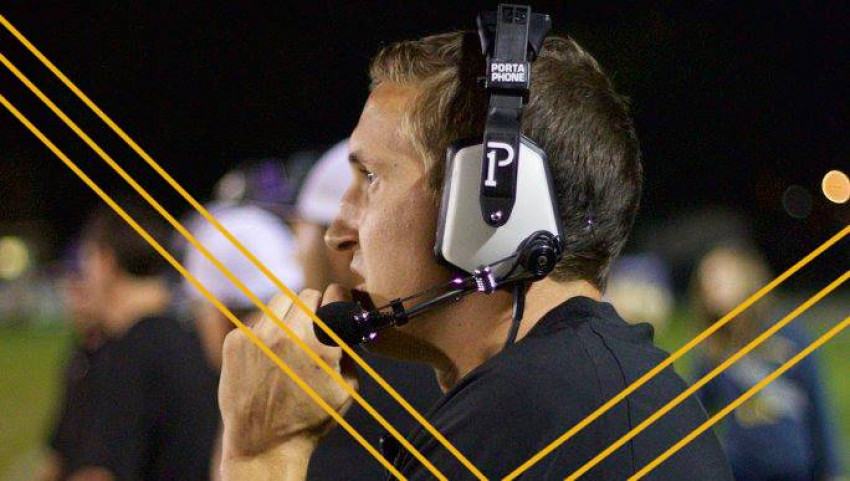 vincent church talking into headphone during football game