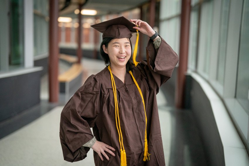 A portrait of Mey Wong in her graduation regalia.