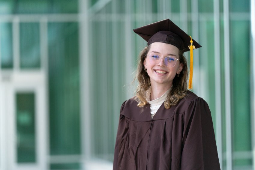 A portrait of Hawke Osterhout in her graduation attire.