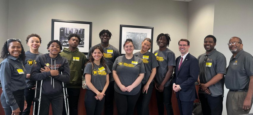 A group photo of Youth Juvenile Justice Fellows with Sen. Sean McCann.