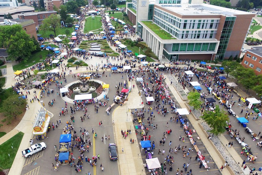 Aerial photo of the Main Campus pedestrian mall filled with students and visitors enjoying the annual Bronco Bash.
