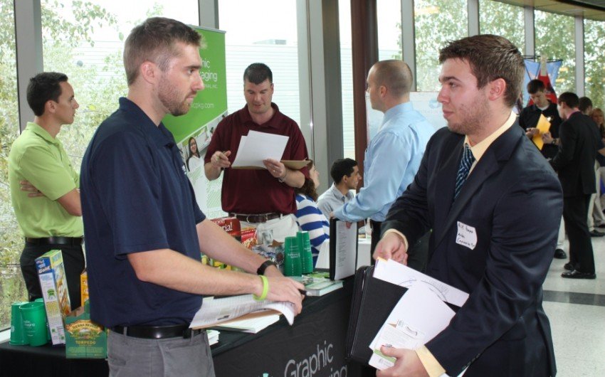 Employer and student at career fair
