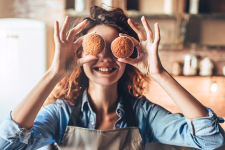 Woman bakes muffins to de-stress  Image Source: Food & Beverage Insider (2020)