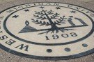 image of the WMU seal in concrete on campus